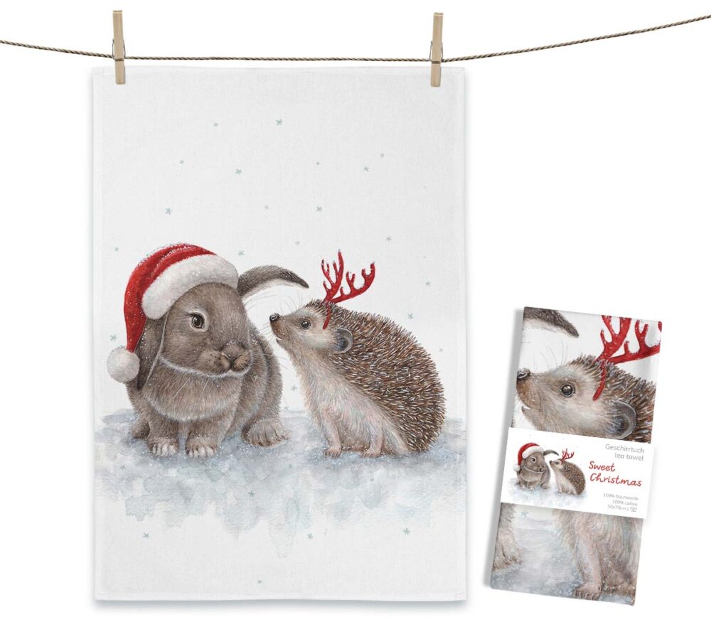 Weißes MALUU Baumwolle Geschirrtuch mit einem winterlichen Aquarell-Motiv von einem Hasen und einem kleinen Igel in festlicher Stimmung.