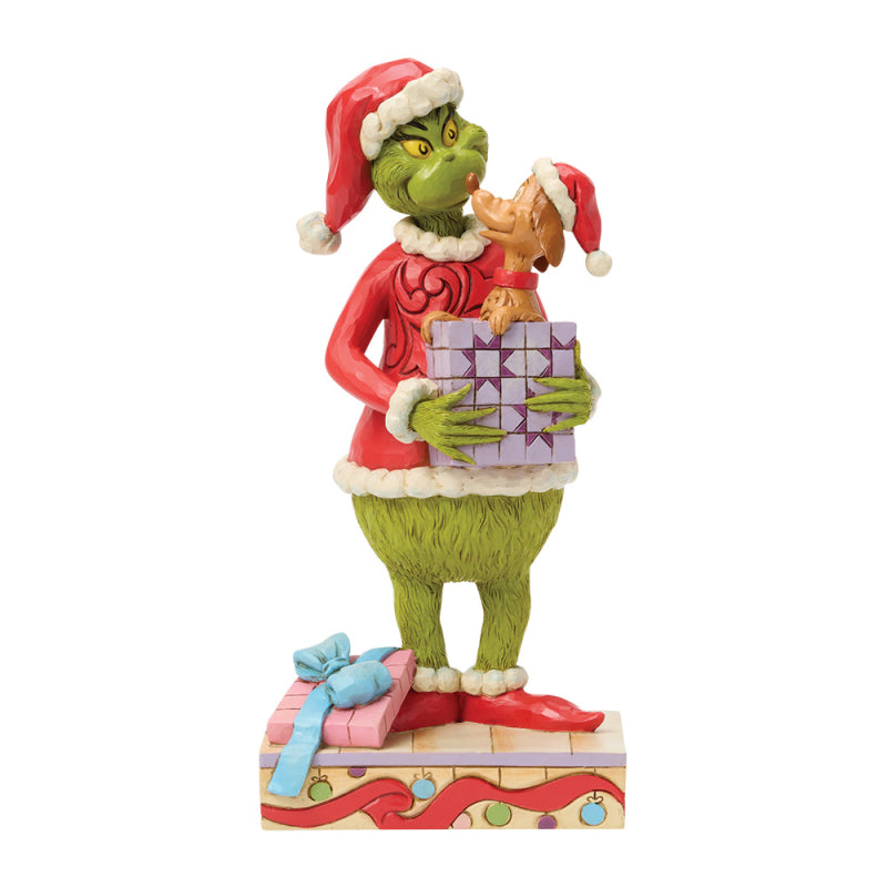 Jim Shore Grinch Figur mit Hund Max, der aus einem Geschenkpaket herausspringt, Modell 6018957