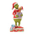 Jim Shore Grinch Figur mit Hund Max, der aus einem Geschenkpaket herausspringt, Modell 6018957