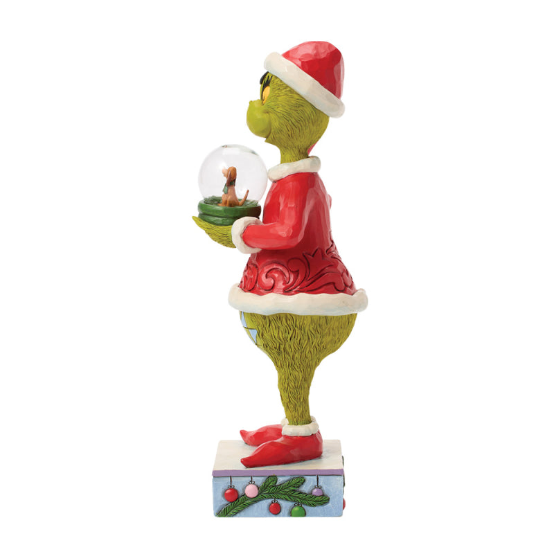 Jim Shore Grinch Figur im Weihnachtsmannkostüm hält eine Schneekugel mit Max und Cindy Lou Who, Modell 6018958.Seite inks