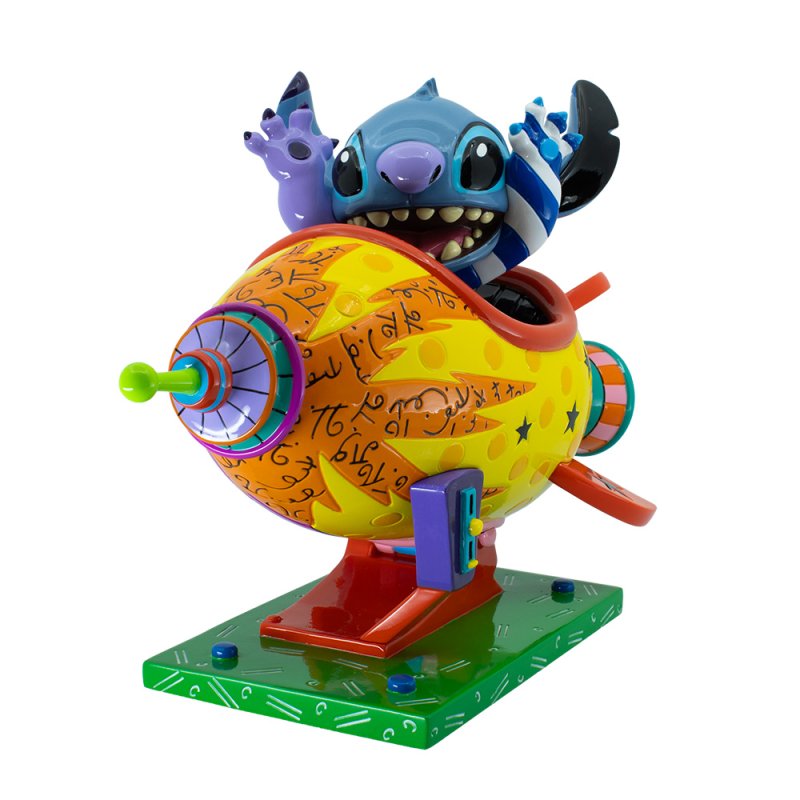 Romero Britto Figur. Stitch sitzt in einer Rakete. Pop Artkunst