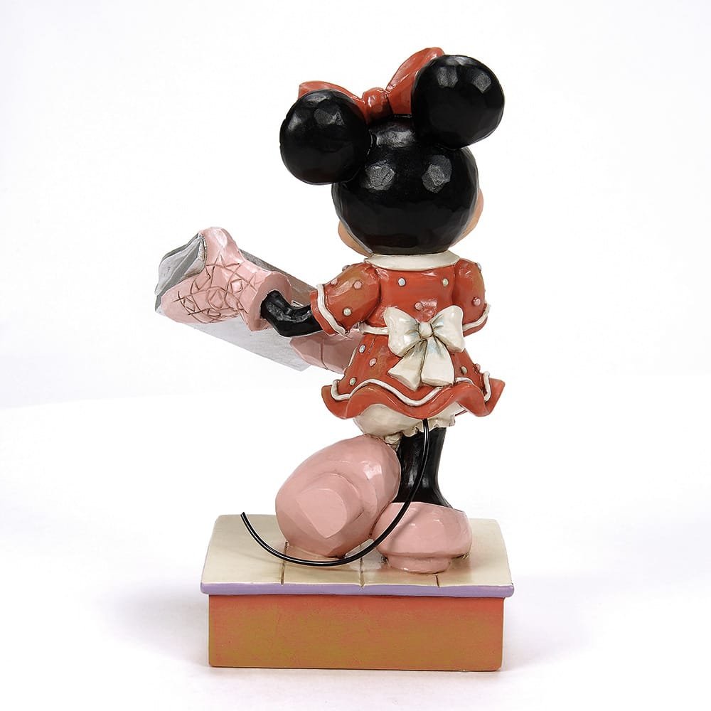 ückansicht der Disney Traditions Minnie Mouse Figur im gepunkteten Kleid mit Backschürze.