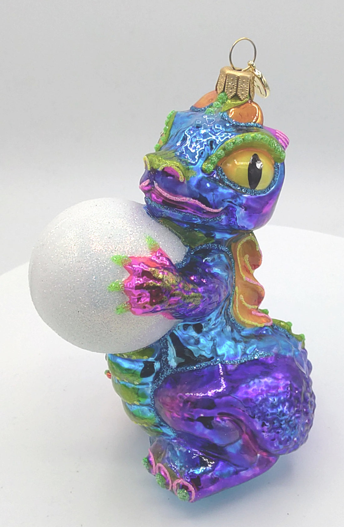 Christbaumschmuck Drache mit Schneeball