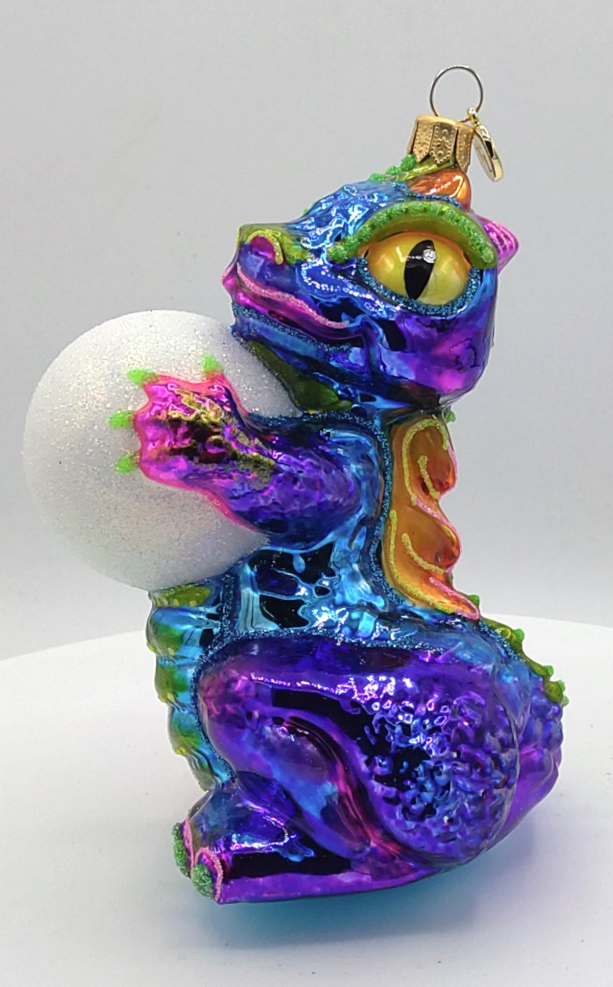 Christbaumschmuck Drache mit Schneeball