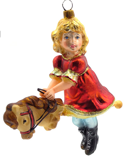 Christbaumschmuck Komozja Mädchen auf Steckenpferd